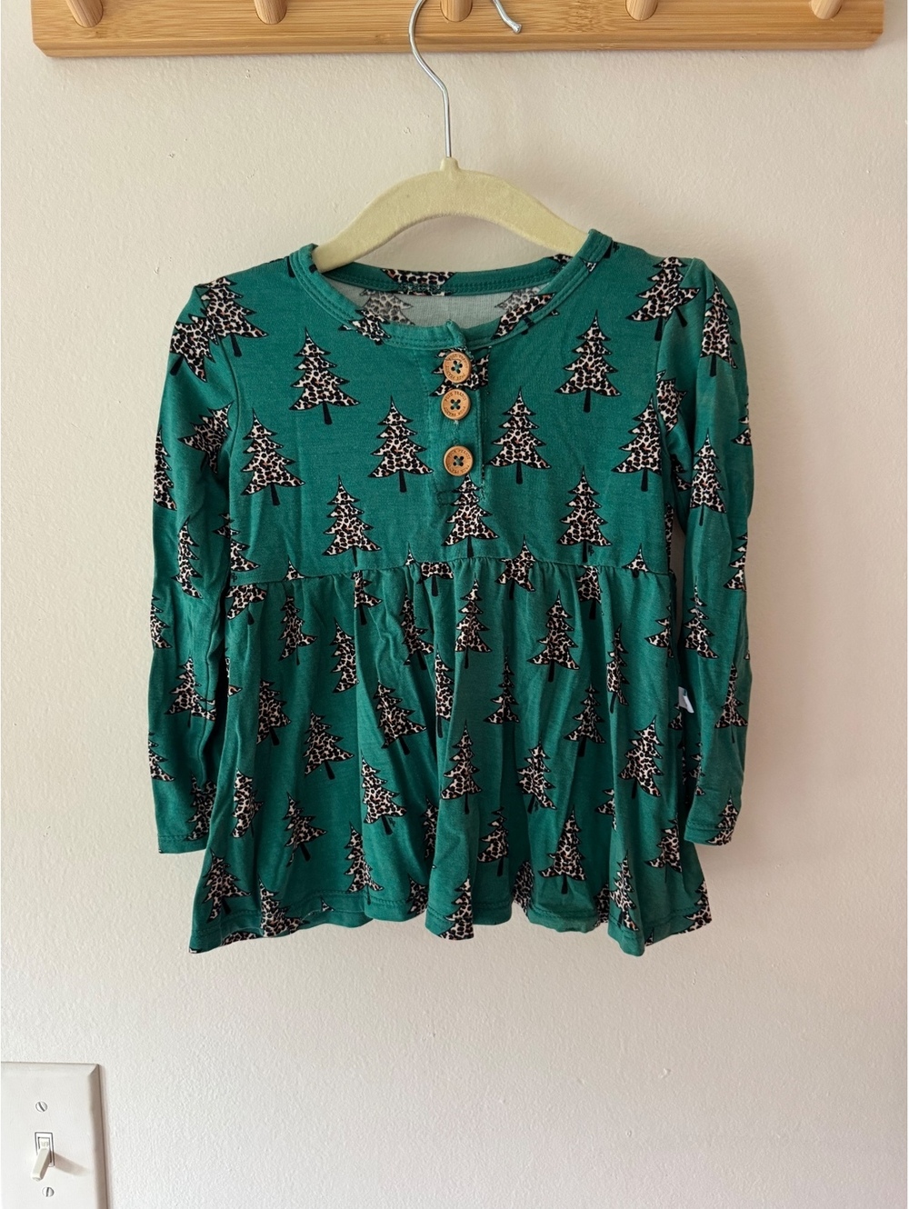 Posh peanut 2T Pine Tree Peplum Top